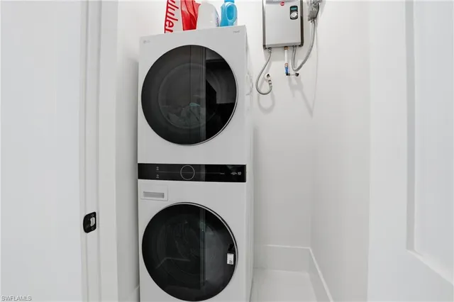 a bathroom with double vanity sink and a mirror