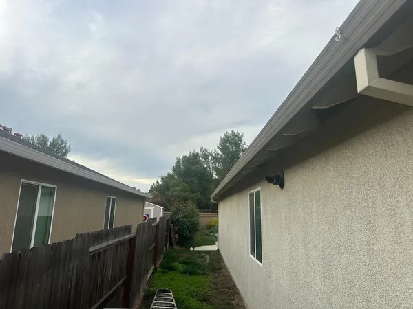 a backyard of a house with lots of green space