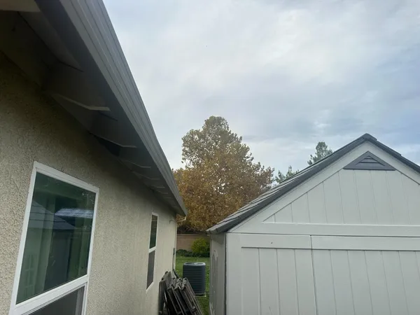 a house with trees in front of it