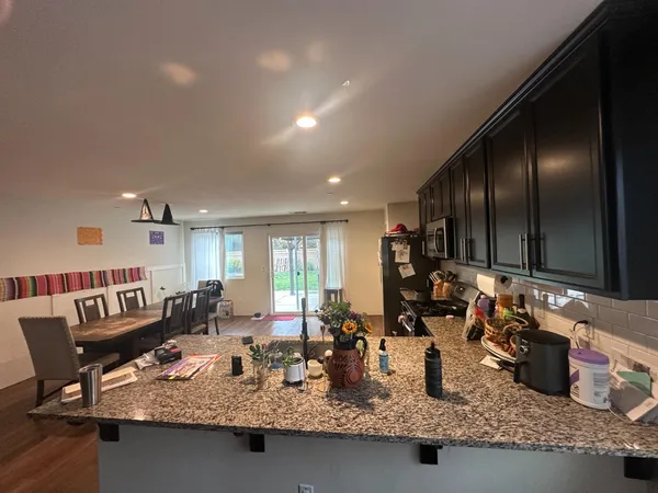 a kitchen with granite countertop lots of counter top space