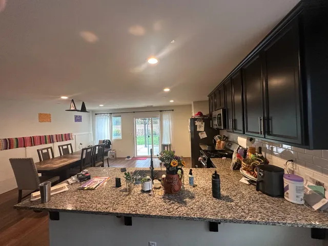 a kitchen with granite countertop lots of counter top space