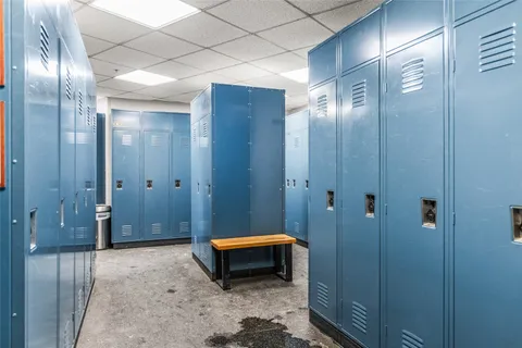 a bathroom with a tub and shower