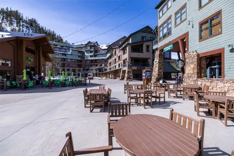 a view of a backyard with a patio