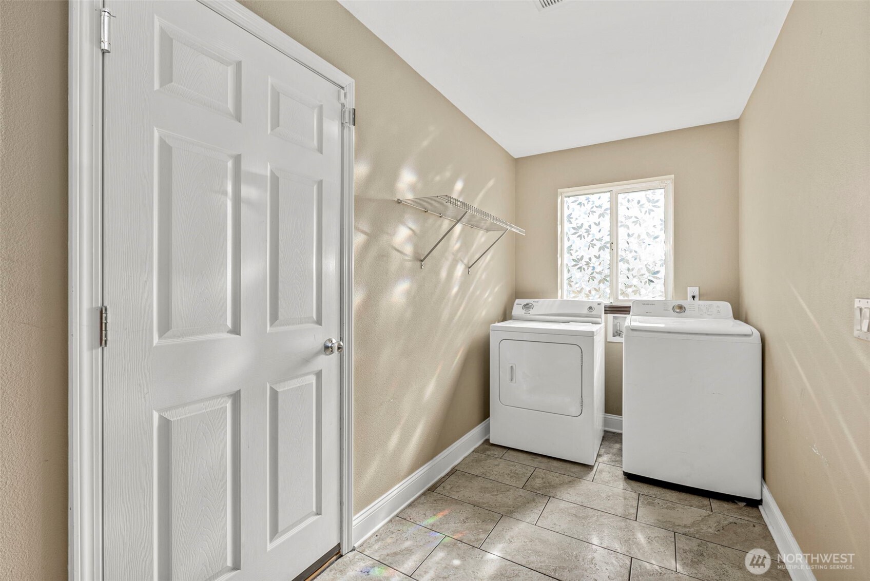 9115 Paradise View Street Yelm, WA 98597 - Photo 19 of 40 a utility room with dryer and washer