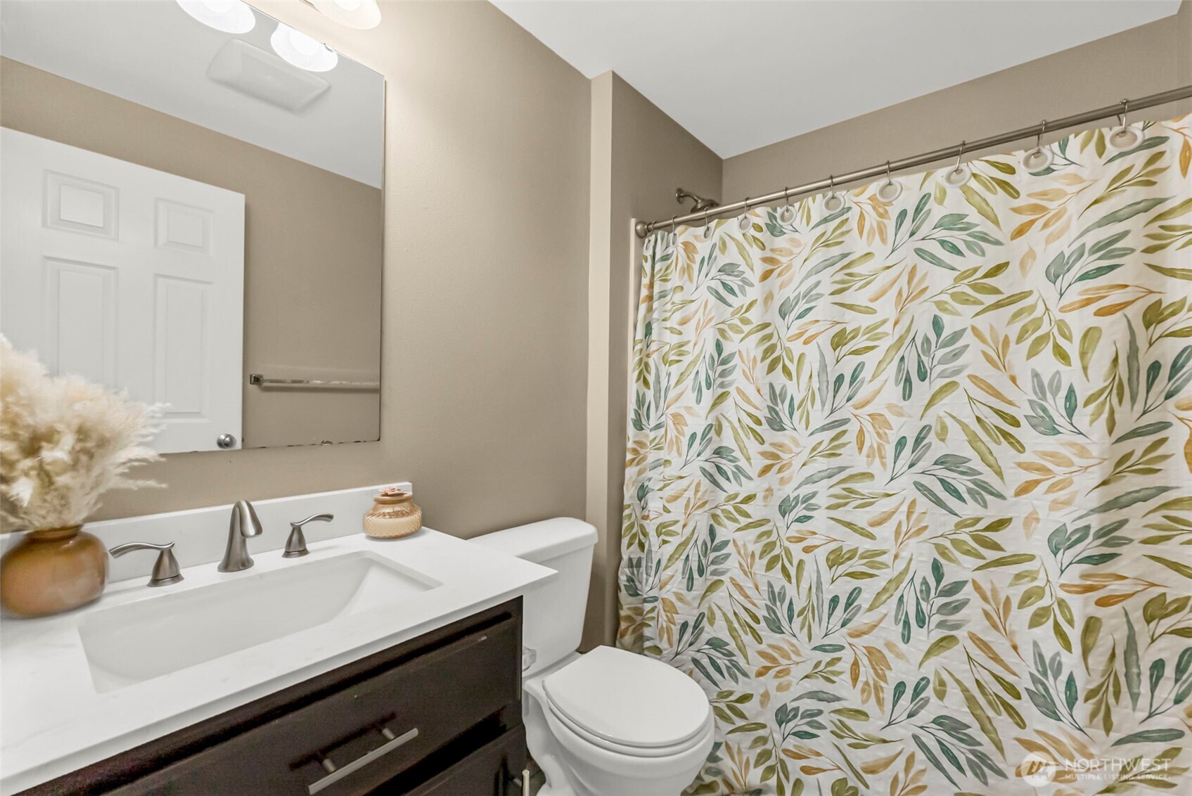 9115 Paradise View Street Yelm, WA 98597 - Photo 22 of 40 a bathroom with a sink and a mirror
