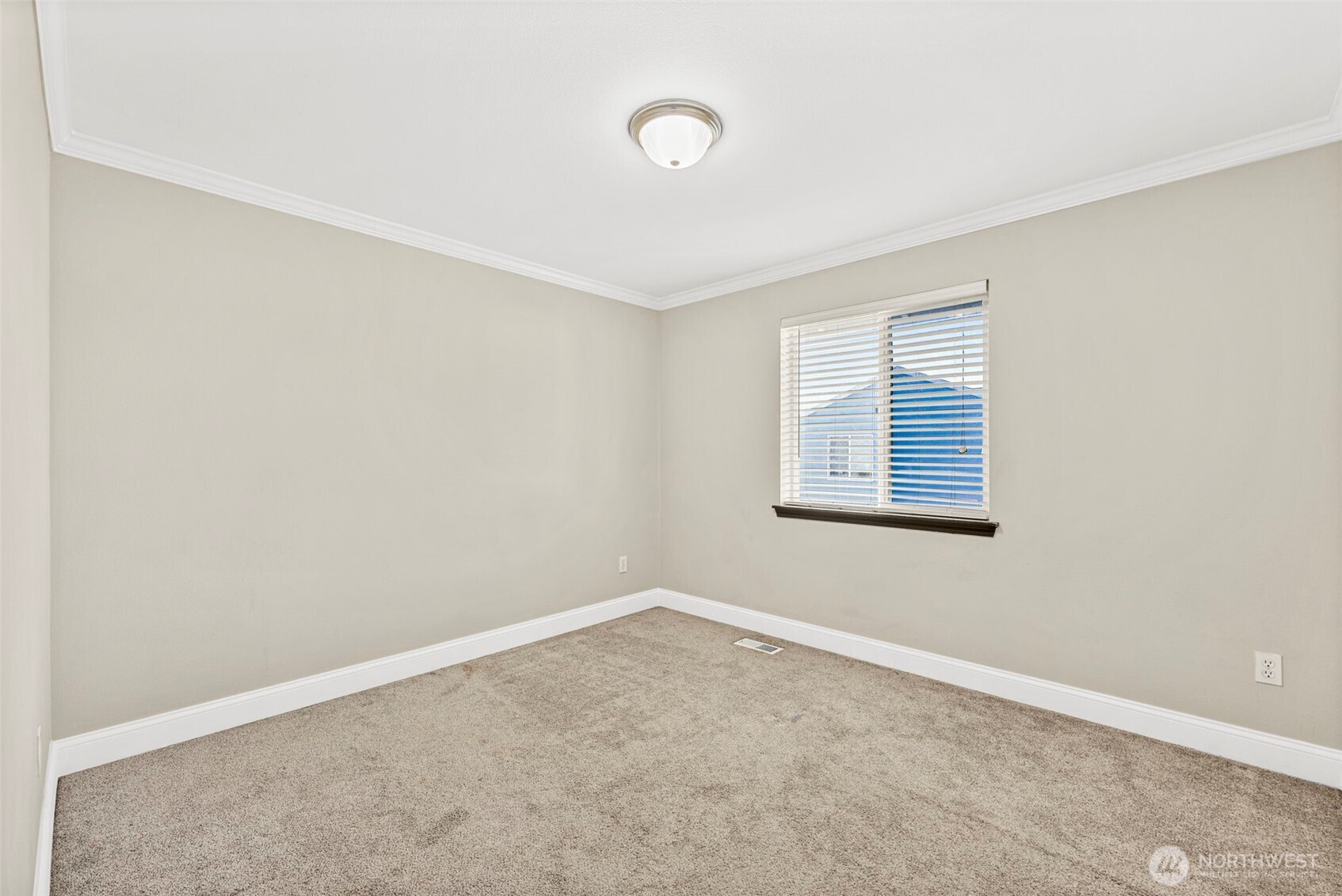 9115 Paradise View Street Yelm, WA 98597 - Photo 30 of 40 a view of an empty room with a window
