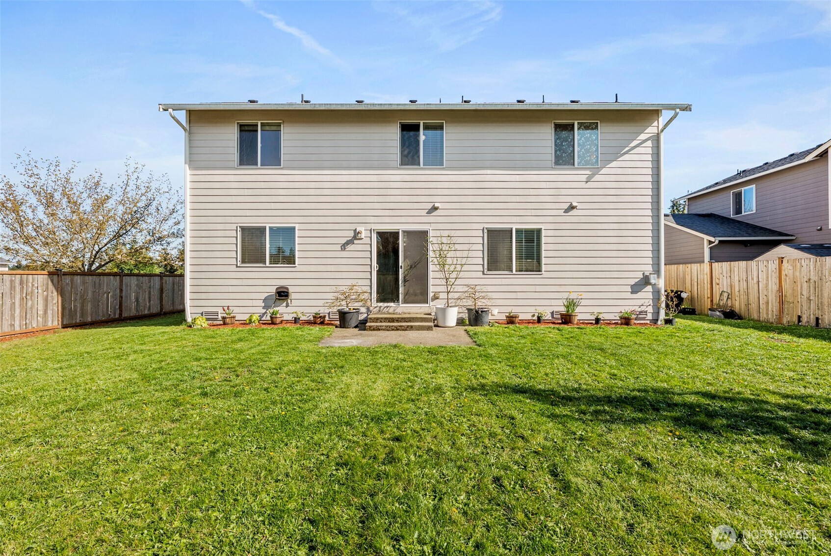9115 Paradise View Street Yelm, WA 98597 - Photo 34 of 40 a front view of house with yard