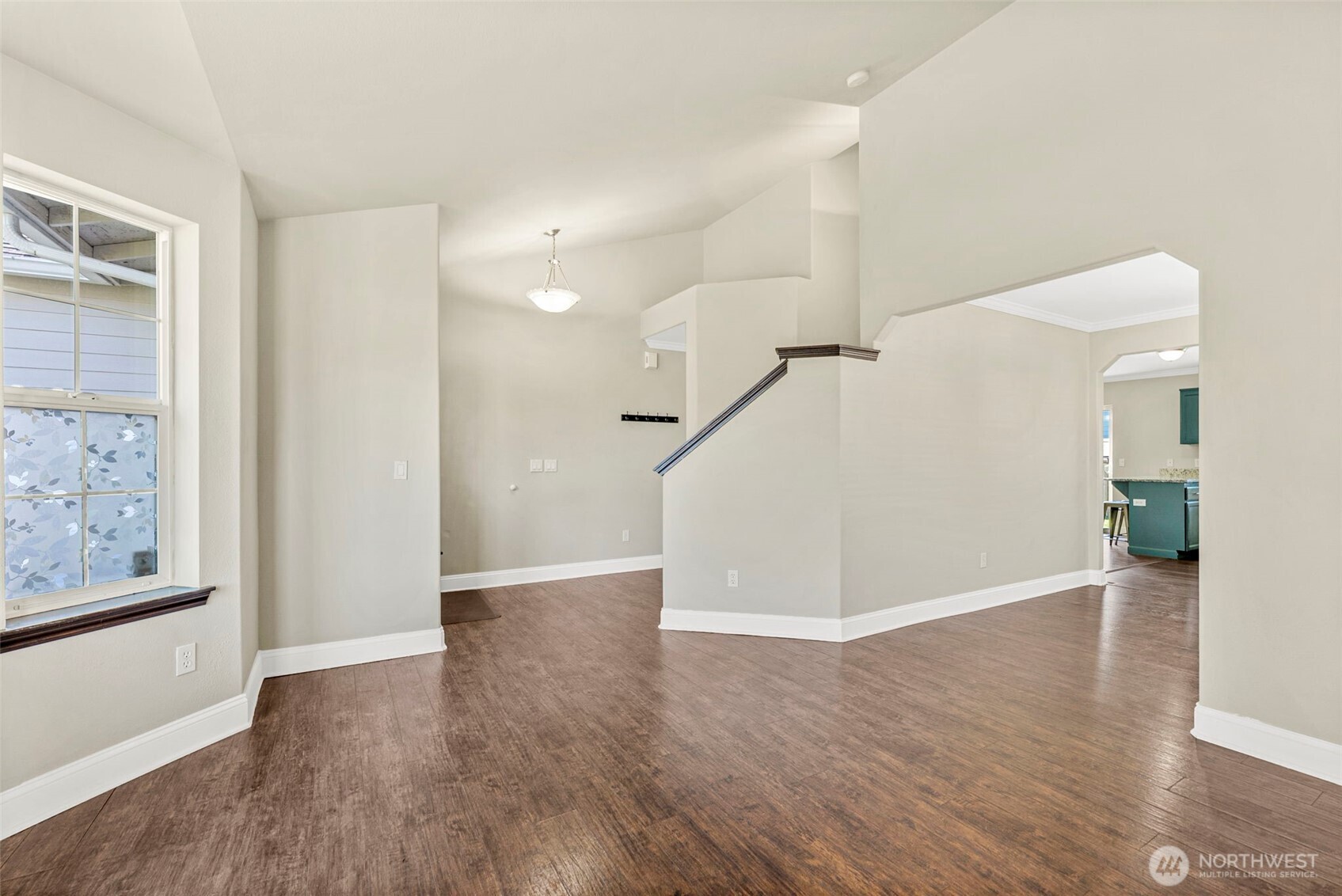 9115 Paradise View Street Yelm, WA 98597 - Photo 7 of 40 wooden floor in an empty room with a window