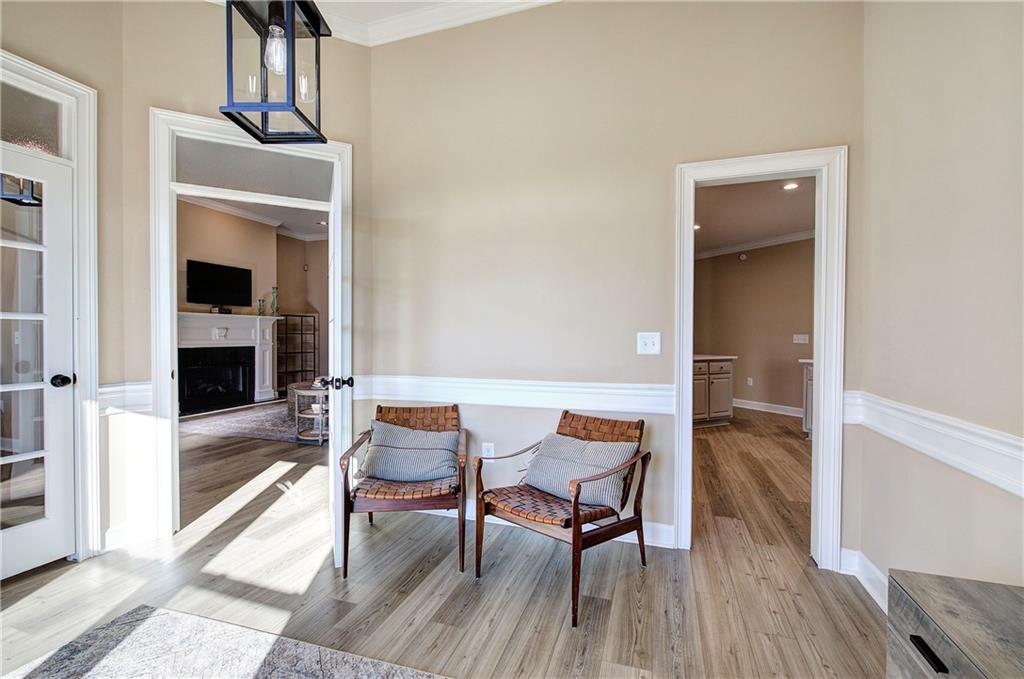 264 Boone Ford Road Southeast Calhoun, GA 30701 - Photo 14 of 66 a view of a dining room with furniture and wooden floor