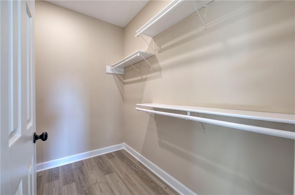 264 Boone Ford Road Southeast Calhoun, GA 30701 - Photo 30 of 66 a view of a room with racks on the wall