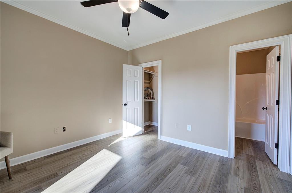 264 Boone Ford Road Southeast Calhoun, GA 30701 - Photo 36 of 66 wooden floor in an empty room with a window