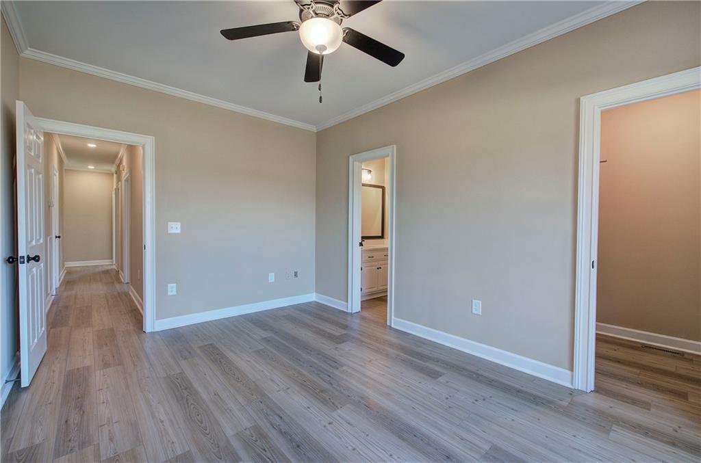 264 Boone Ford Road Southeast Calhoun, GA 30701 - Photo 42 of 66 wooden floor in an empty room with a window