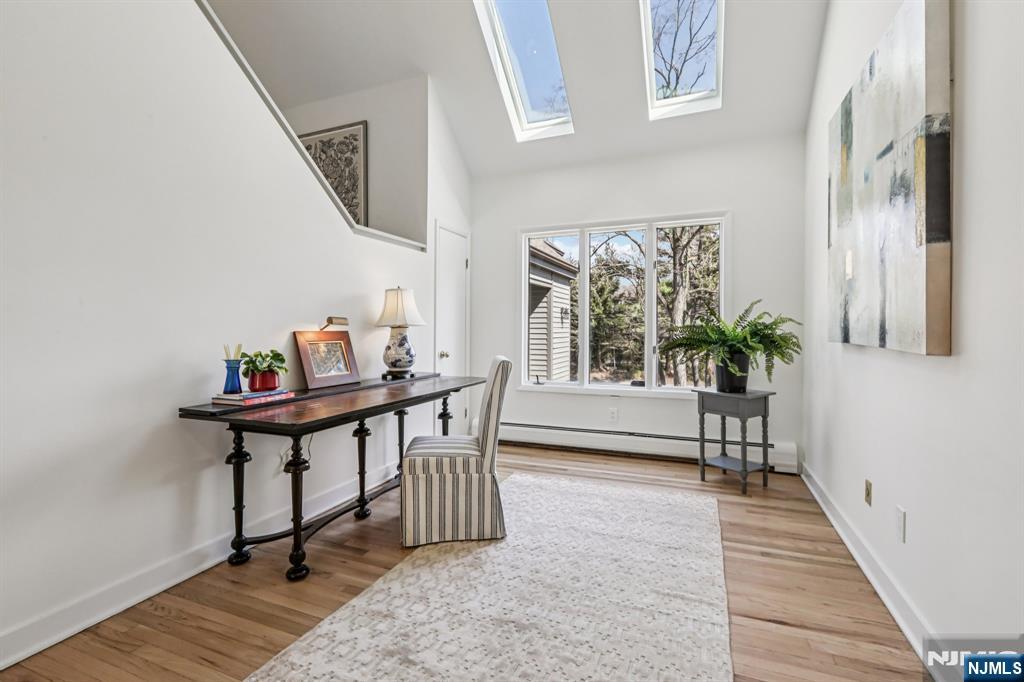 11 Carlough Road Upper Saddle River, NJ 07458 - Photo 21 of 41 a view of a room with furniture window and wooden floor