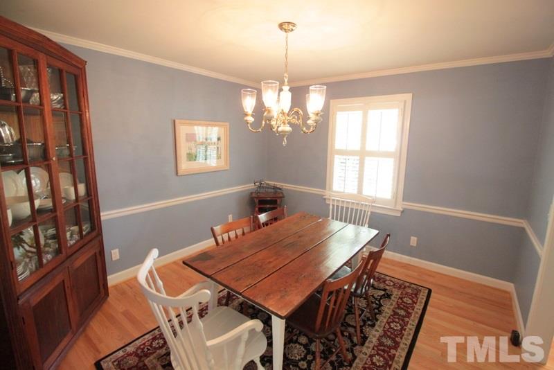 6921 Electra Drive Raleigh, NC 27607 - Photo 5 of 22 a view of a dining room with furniture and window