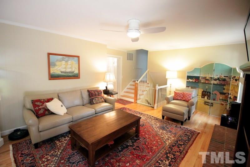 6921 Electra Drive Raleigh, NC 27607 - Photo 10 of 22 a living room with furniture and a fireplace