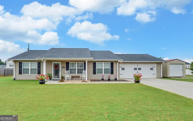 a front view of a house with patio