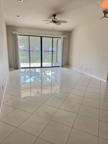 a view of a refrigerator and window