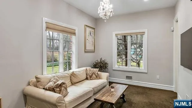 a bathroom with a granite countertop bathtub a shower and a sink