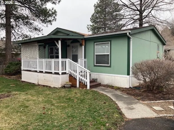 a house with white door of front of house