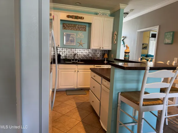 $277,900 | 1515 East Beach Boulevard, Unit 104, Pass Christian, MS 39571