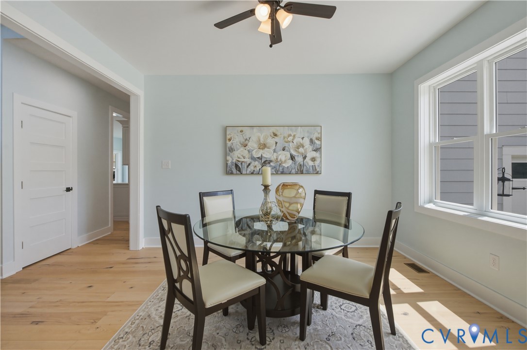 1355 Cowart Road Lottsburg, VA 22511 - Photo 12 of 65 a view of a dining room with furniture and a window