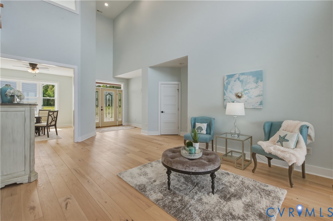 1355 Cowart Road Lottsburg, VA 22511 - Photo 16 of 65 a living room with furniture and wooden floor