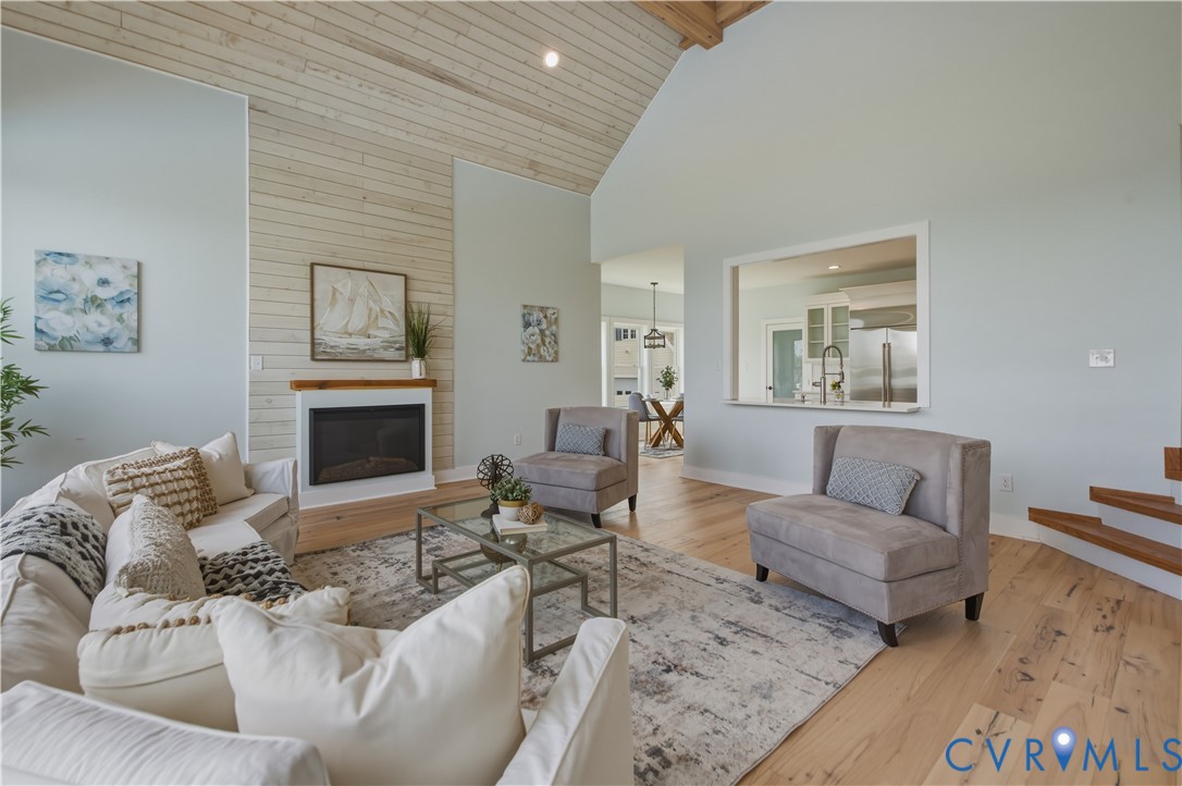 1355 Cowart Road Lottsburg, VA 22511 - Photo 22 of 65 a living room with furniture and a fireplace