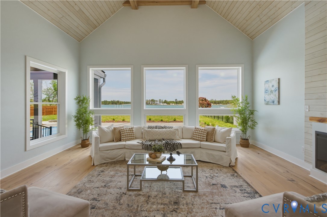 1355 Cowart Road Lottsburg, VA 22511 - Photo 24 of 65 a living room with furniture and a large window