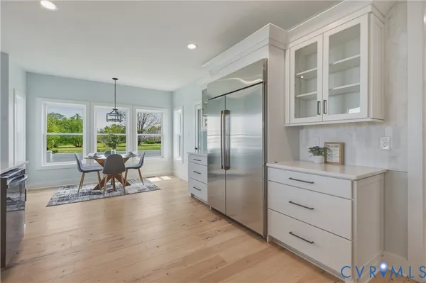 a view of storage and utility room with a washer dryer