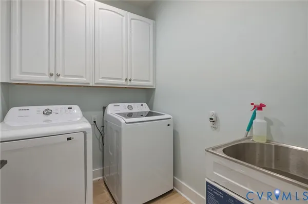 a spacious bedroom with a large bed and a window