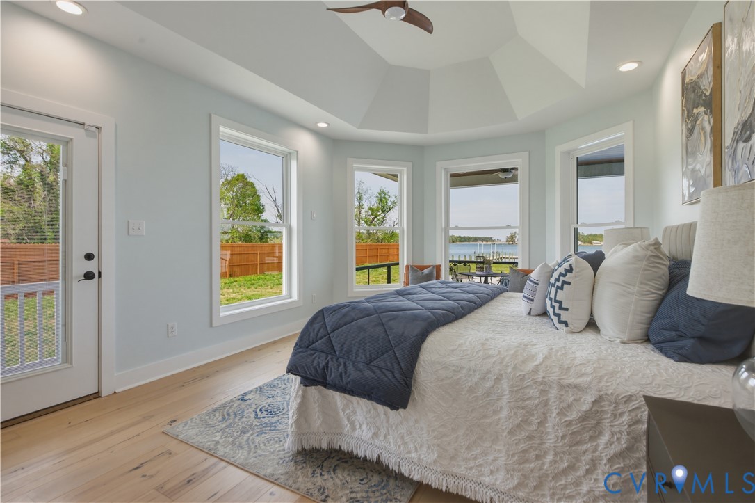 1355 Cowart Road Lottsburg, VA 22511 - Photo 40 of 65 a bedroom with a large bed and a window