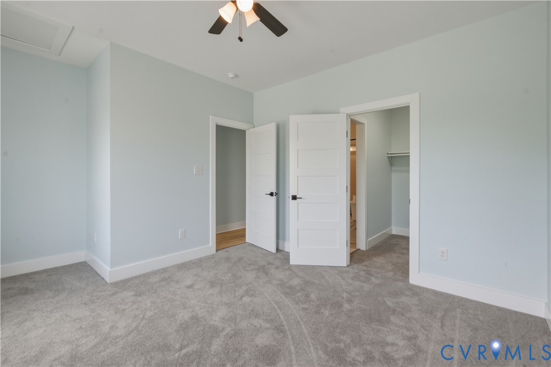 1355 Cowart Road Lottsburg, VA 22511 - Photo 48 of 65 an empty room with chandelier fan
