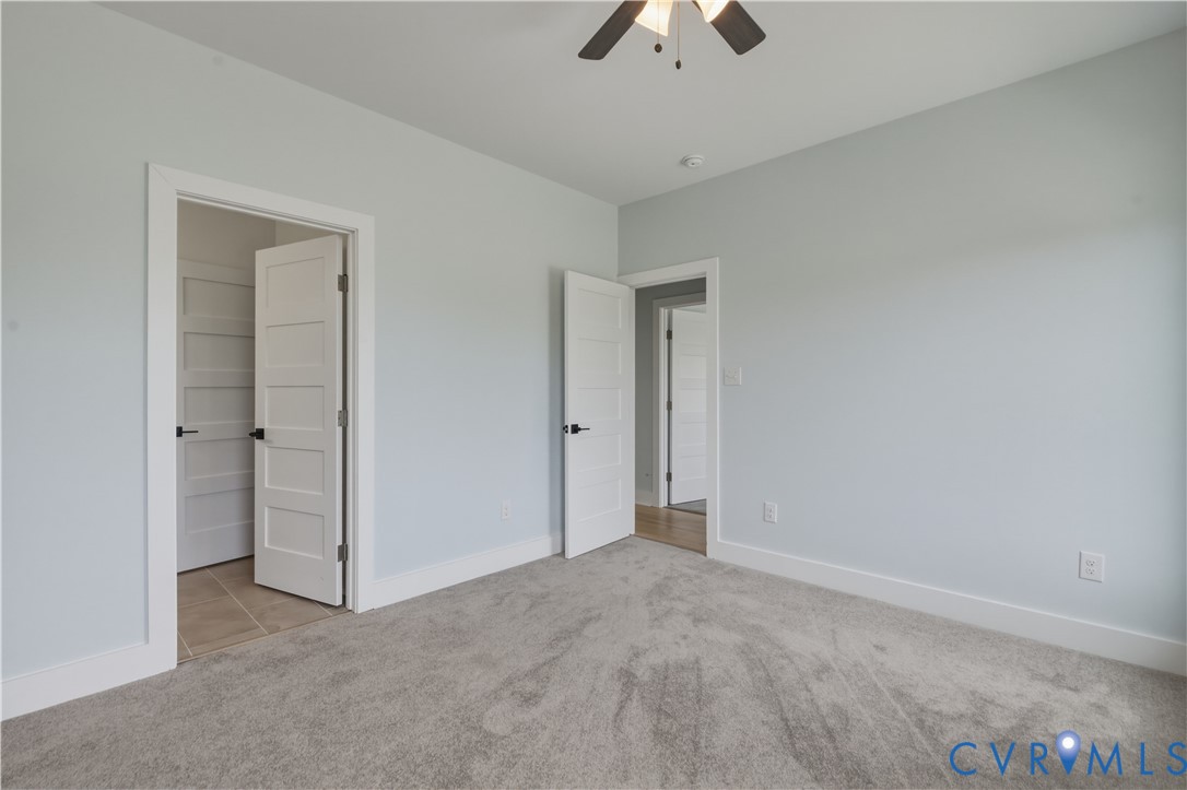 1355 Cowart Road Lottsburg, VA 22511 - Photo 50 of 65 an empty room with fan