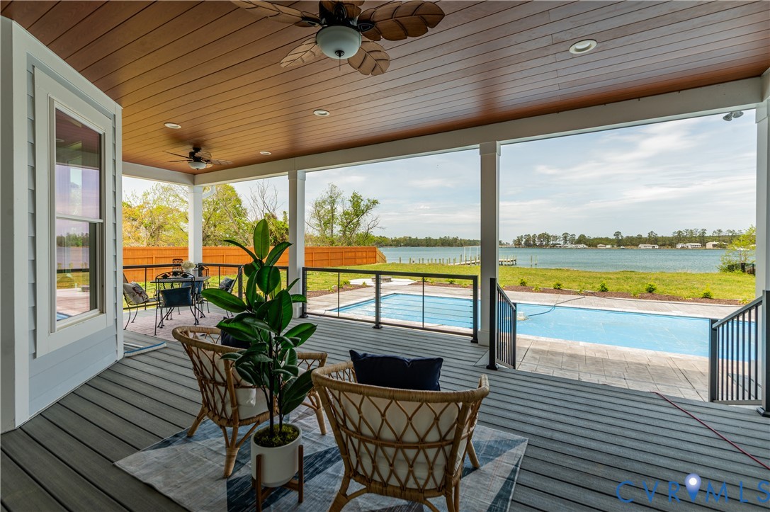 1355 Cowart Road Lottsburg, VA 22511 - Photo 53 of 65 a view of swimming pool with outdoor seating