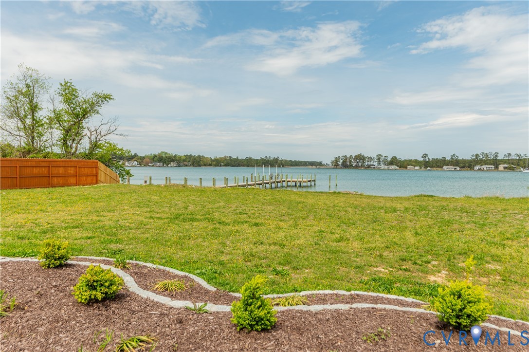 1355 Cowart Road Lottsburg, VA 22511 - Photo 55 of 65 a view of a lake with a big yard
