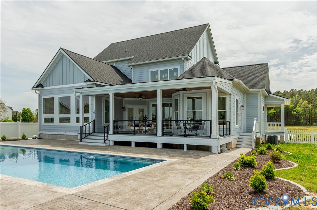 1355 Cowart Road Lottsburg, VA 22511 - Photo 56 of 65 front view of a house with a swimming pool