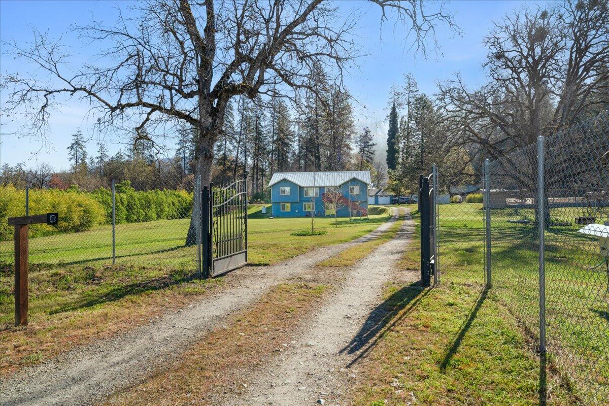 649 Pleasant Valley Road Merlin, OR 97532 - Photo 2 of 57 a view of a park with large trees