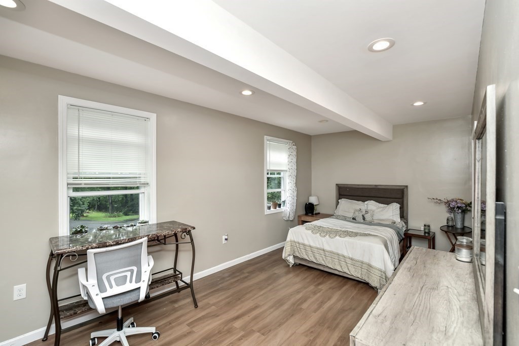 106 Haynes Road Stoughton, MA 02072 - Photo 16 of 34 a bedroom with a bed and a large window