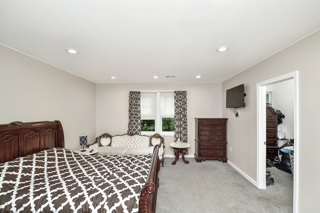 106 Haynes Road Stoughton, MA 02072 - Photo 21 of 34 a living room with furniture