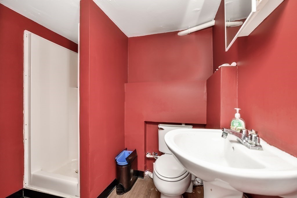 106 Haynes Road Stoughton, MA 02072 - Photo 26 of 34 a bathroom with a sink a toilet and shower