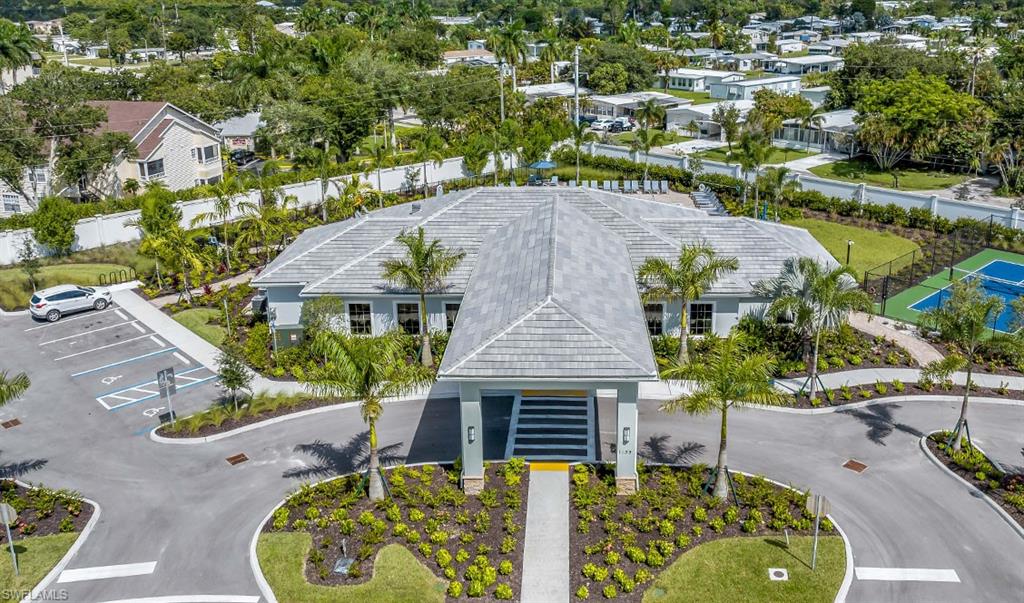 922 Enbrook Loop, Unit 46 Naples, FL 34114 - Photo 21 of 31 an aerial view of a house with a garden