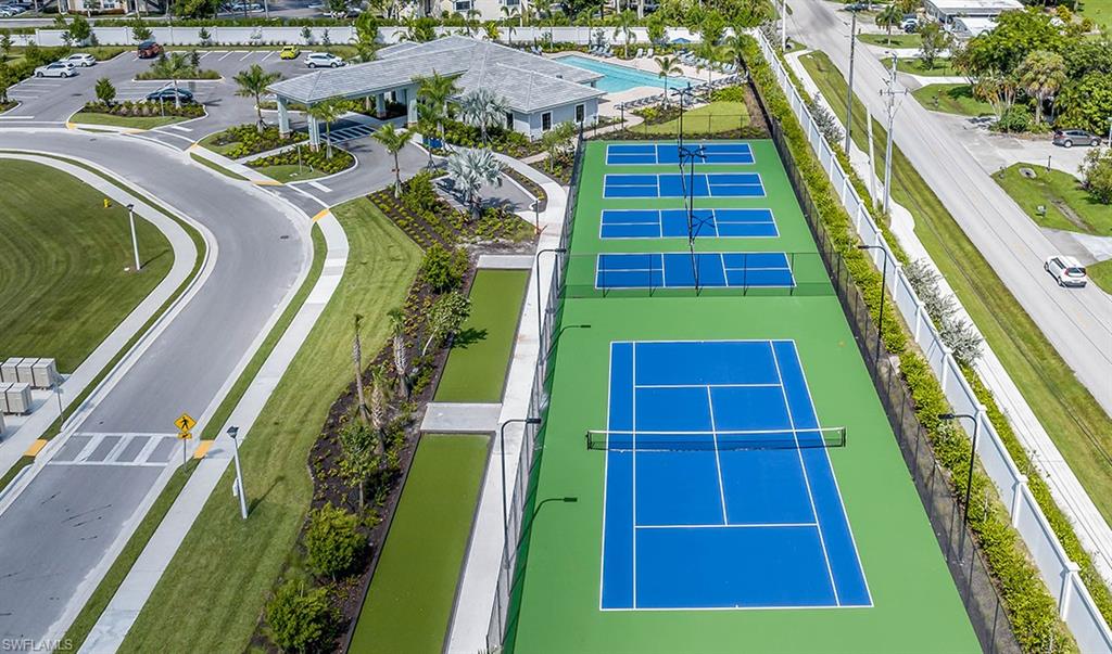 922 Enbrook Loop, Unit 46 Naples, FL 34114 - Photo 31 of 31 a view of swimming pool with a balcony