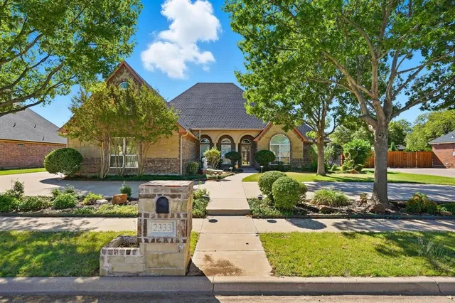 a view of backyard with swimming pool and outdoor seating