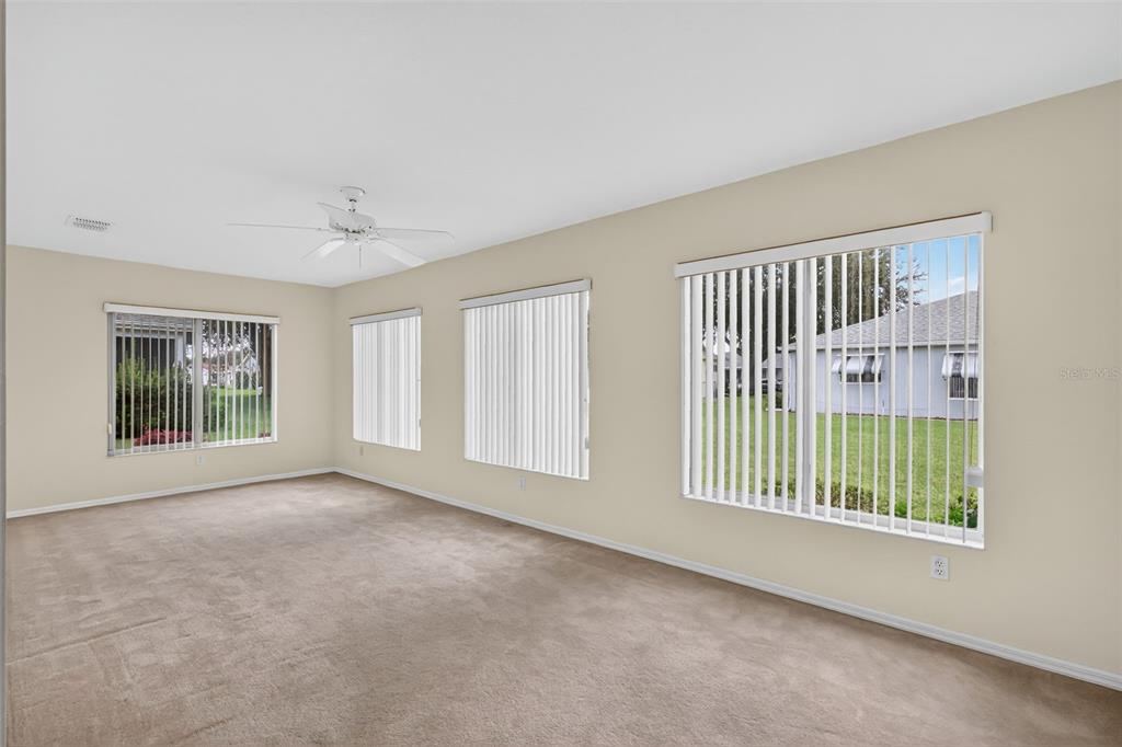 11353 Southwest 138th Lane Dunnellon, FL 34432 - Photo 11 of 33 a view of an empty room with a window