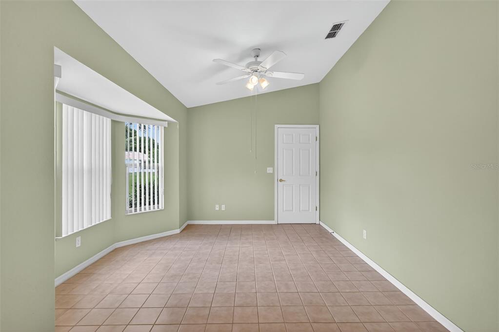 11353 Southwest 138th Lane Dunnellon, FL 34432 - Photo 16 of 33 a view of an empty room with a window