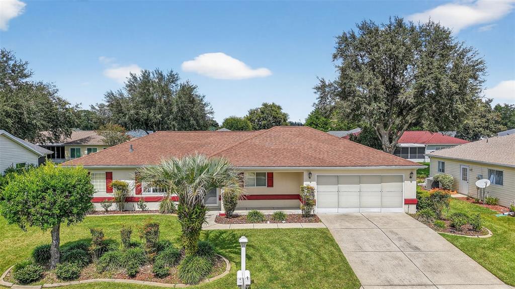 11353 Southwest 138th Lane Dunnellon, FL 34432 - Photo 2 of 33 a front view of house with yard and green space