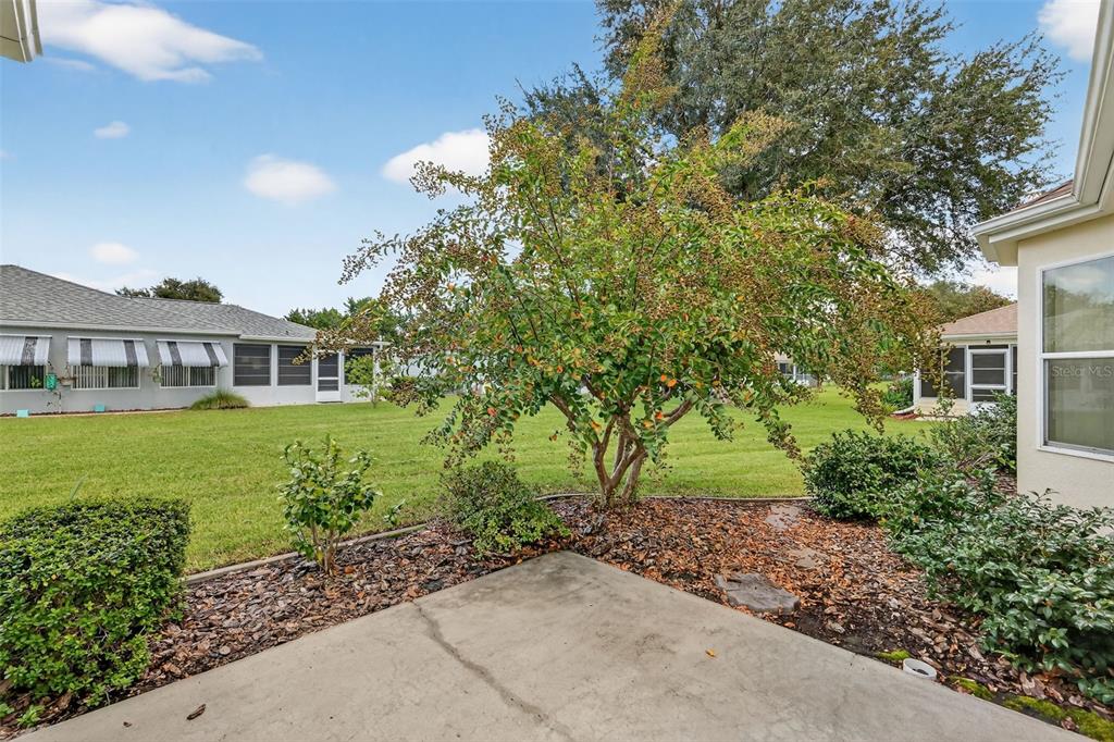 11353 Southwest 138th Lane Dunnellon, FL 34432 - Photo 27 of 33 a view of a house with a garden