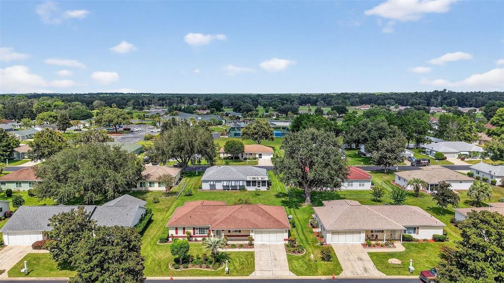 11353 Southwest 138th Lane Dunnellon, FL 34432 - Photo 32 of 33 an aerial view of residential houses with outdoor space and street view