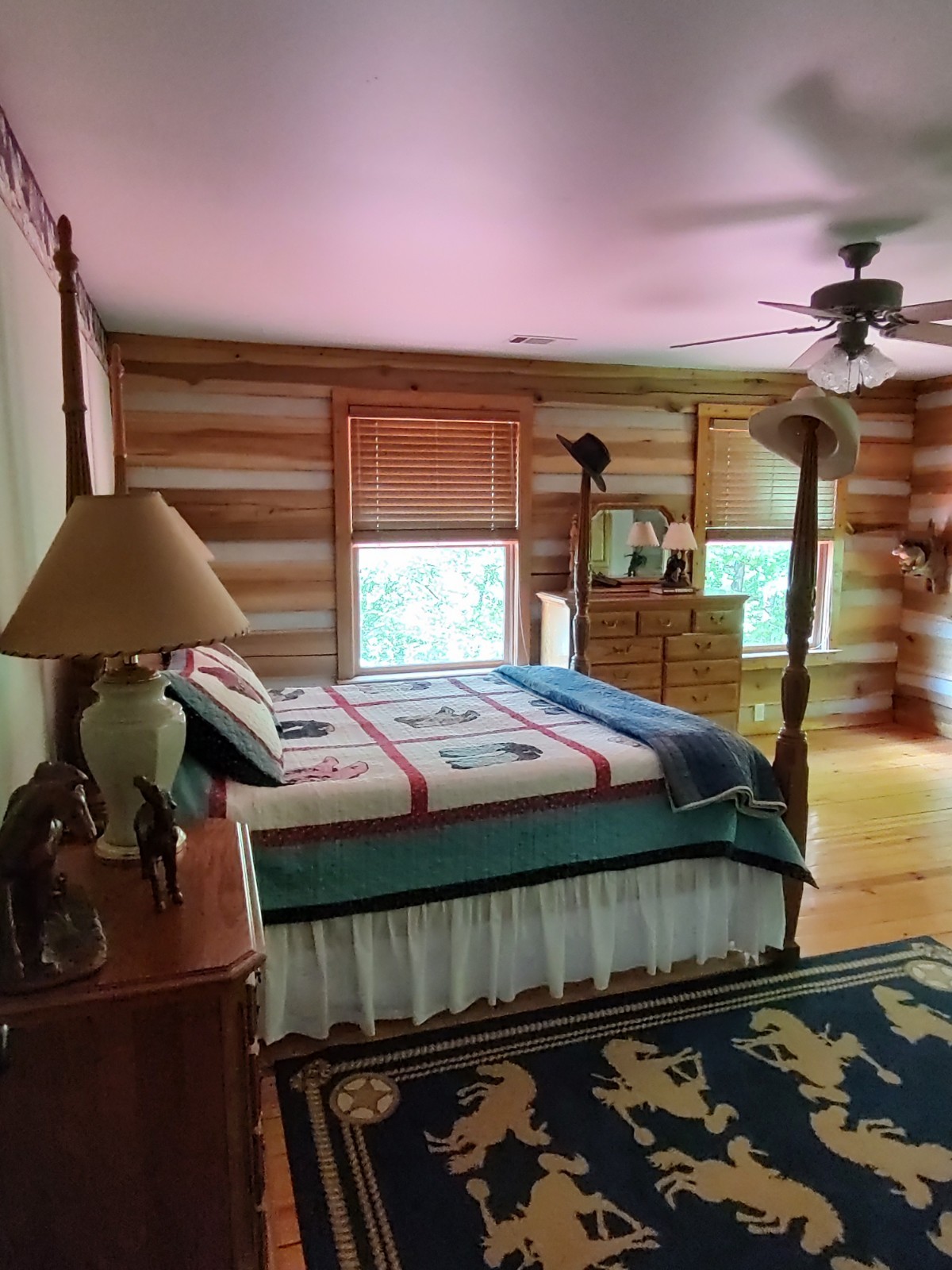 4934 Bethesda-Duplex Road College Grove, TN 37046 - Photo 5 of 18 a bed sitting in a bedroom next to a window