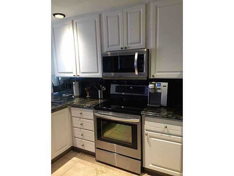 1943 Frederick Small Road, Unit 1943 Jupiter, FL 33458 - Photo 10 of 34 Kitchen